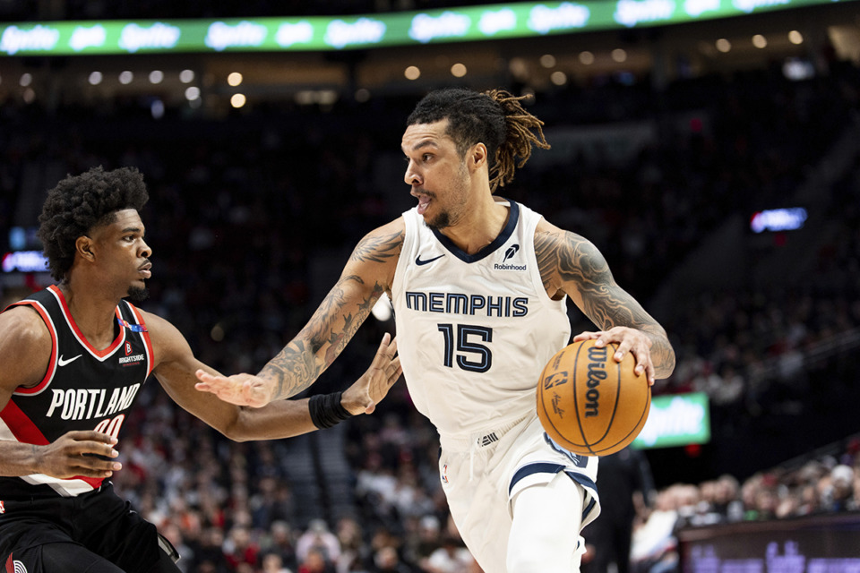 <strong>Memphis Grizzlies forward Brandon Clarke, right, drives to the hoop against Portland Trail Blazers guard Scoot Henderson, left, during the second half of an NBA basketball game Sunday, Nov. 10, 2024, in Portland, Ore.</strong> (Howard Lao/AP Photo)