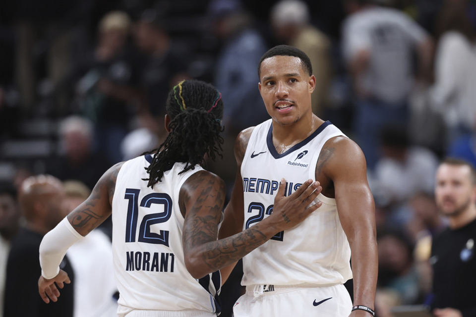 <strong>Memphis Grizzlies guard Ja Morant (12) and guard Desmond Bane (22) reacts to a play against the Utah Jazz during the second half of an NBA basketball game, Wednesday, Oct. 23, 2024, in Salt Lake City. Both players are currently dealing with injuries and are on a week-to-week status.</strong> (Rob Gray/AP Photo file)