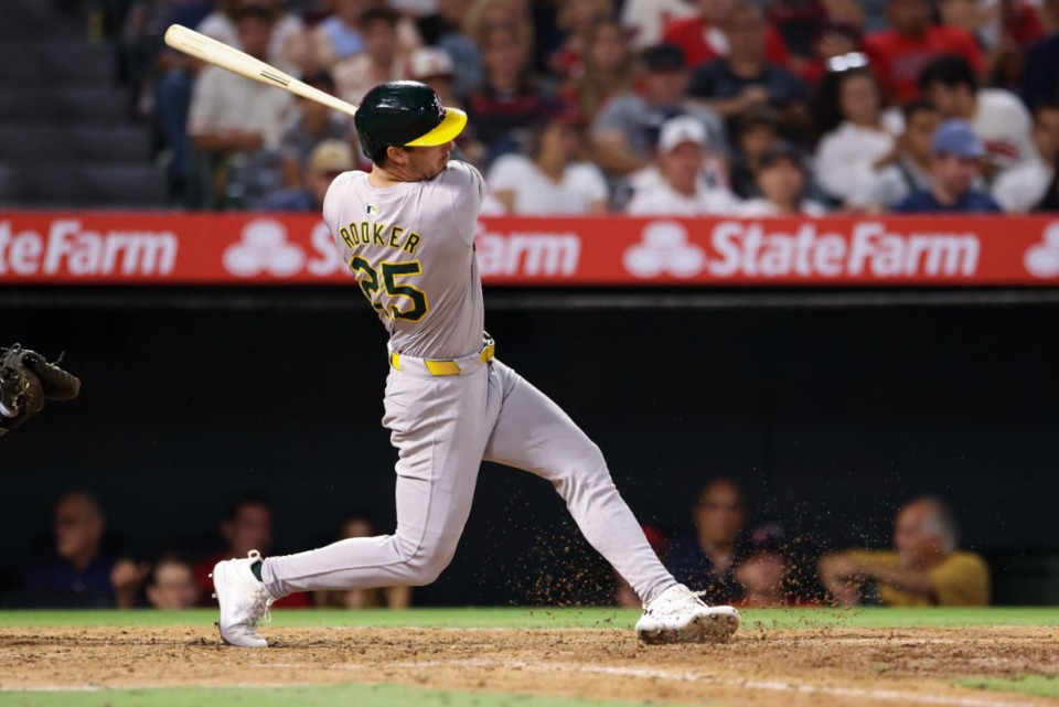 <strong>Former ECS and Mississippi State star and current Oakland Athletics outfielder Brent Rooker (25) follows through on a swing after hitting a single during the eighth inning of a baseball game against the Los Angeles Angels in Anaheim, Calif., Saturday, July 27, 2024.</strong> (Jessie Alcheh/AP Photo file)