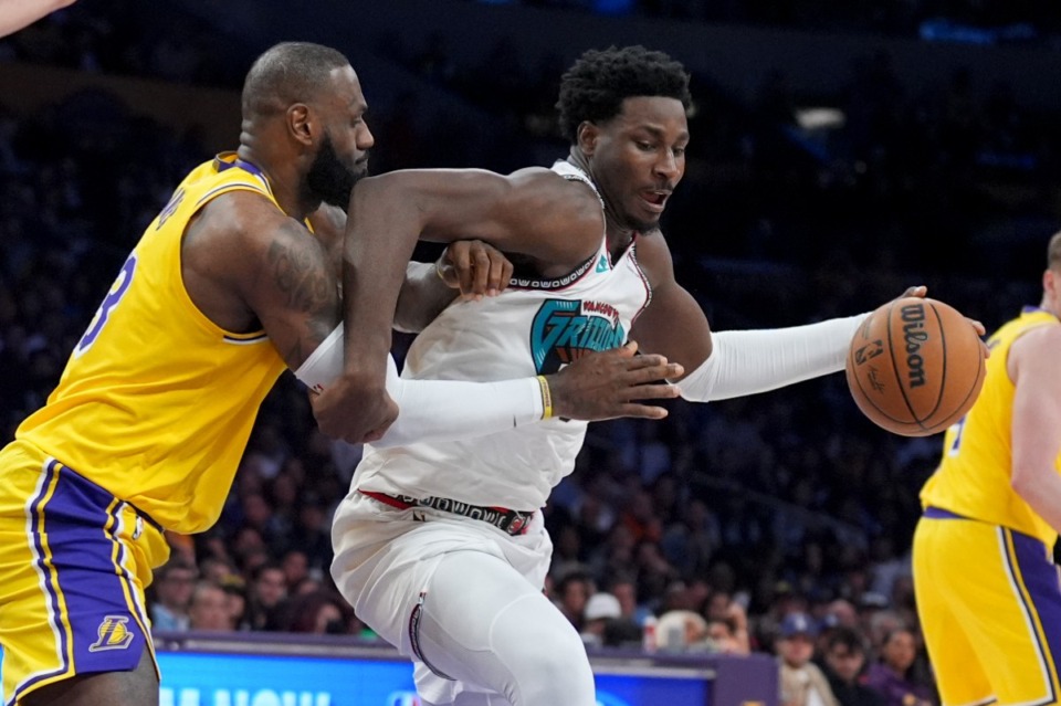 <strong>Memphis Grizzlies forward Jaren Jackson Jr., right, battles Los Angeles Lakers forward LeBron James on Wednesday, Nov. 13, 2024, in Los Angeles. Jackson finished with 29 points.</strong> (Marcio Jose Sanchez/AP)