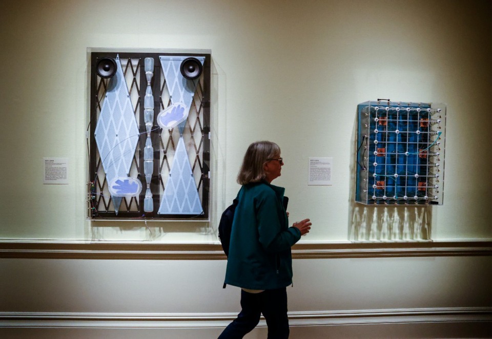 <strong>A visitor walks past Dixon Gallery &amp; Gardens exhibition "Scott A. Carter: Energy States" on Tuesday, Nov. 6, 2024.</strong> (Mark Weber/The Daily Memphian)