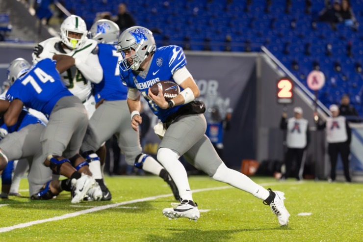 <strong>Memphis Tiger quarterback Harris Boyd (14) rushes for a touchdown against the UAB Blazers during the second half on No.v 16, 2024 at Simmons Bank Liberty Stadium.</strong> (Wes Hale/Special to The Daily Memphian)