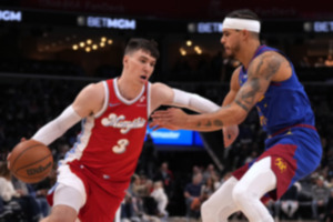 <strong>Memphis Grizzlies forward Jake LaRavia (3) drives against Denver Nuggets' Michael Porter Jr., right, in the first half of an NBA basketball game Sunday, Nov. 17, 2024, in Memphis.</strong> (Mark Humphrey/AP Photo)