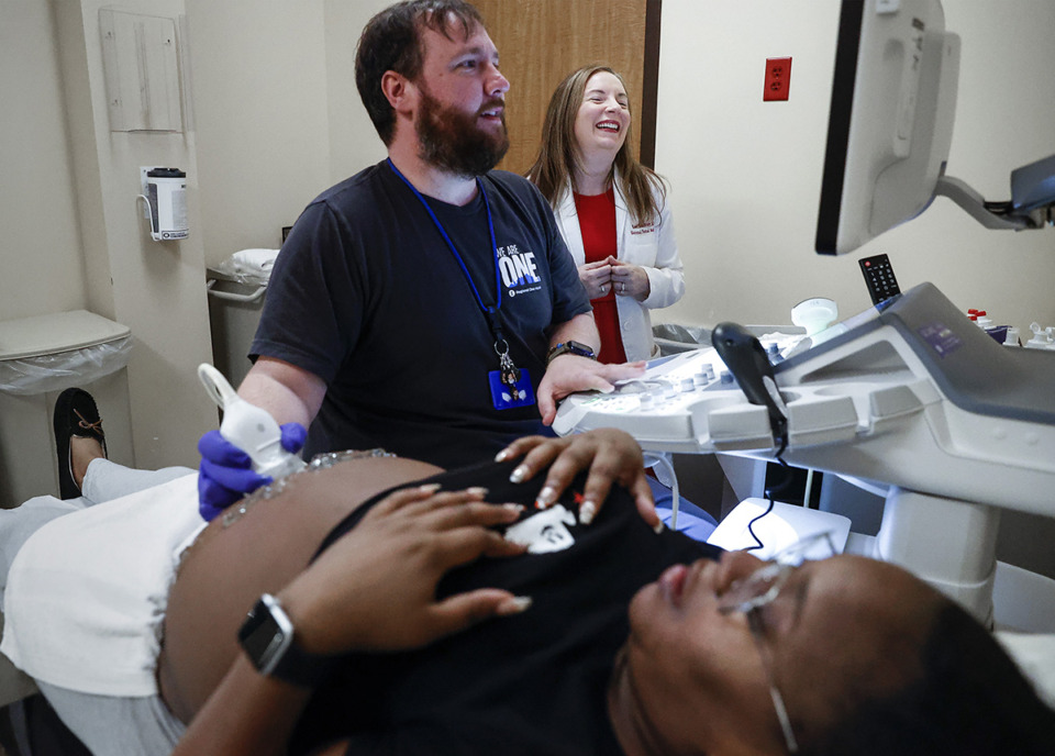 <strong>Soon-to-be mother Nortosha Hudson receives an ultrasound from Dr. Kerri Brackney and sonographer Matt Fletcher at Regional One Health Center for High-Risk Pregnancy.</strong> (Mark Weber/The Daily Memphian file)