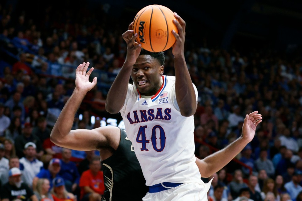 <strong>Kansas forward Flory Bidunga (40) grabs a rebound during the second half of an NCAA college basketball game against Oakland, Saturday, Nov. 16, 2024, in Lawrence, Kan.</strong> (AP Photo/Colin E. Braley)