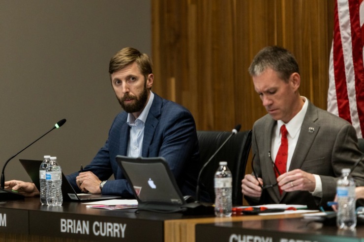 Daniel Chatham, left, during a Germantown Board of Education meeting. (Brad Vest/Special to The Daily Memphian file)