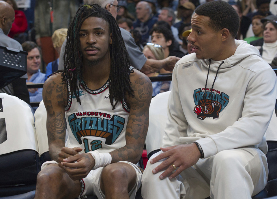 <strong>Memphis Grizzlies guard Ja Morant (12) has missed the last five games with a hip injury. He reamins week-to-week. Morant talks with teammate Desmond Bane, right, after Morant exited the game with an injury in the second half against the Los Angeles Lakers Wednesday, Nov. 6, 2024, in Memphis.</strong> (Nikki Boertman/AP Photo)