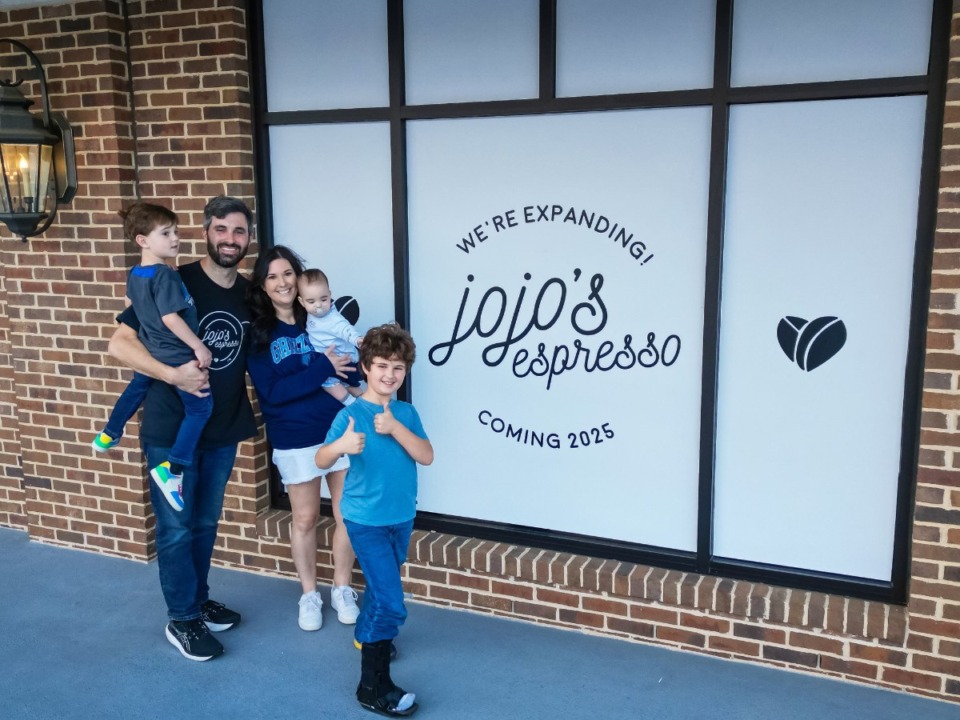 <strong>The Whiddon family stand in front of their new location at&nbsp;at 1730 S. Germantown Road.</strong> (Sophia Surrett/The Daily Memphian)