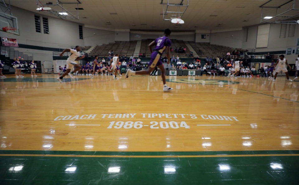 <strong>White Station High School held a court-naming ceremony for longtime coach Terry Tippett before the men&rsquo;s basketball home opener against CBHS Nov. 23, 2019.</strong> (Patrick Lantrip/The Daily Memphian file)