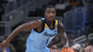 <strong>Marquette's Kam Jones plays during the first half of an NCAA college basketball game against Purdue Tuesday, Nov. 19, in Milwaukee.</strong> (Morry Gash/AP file)