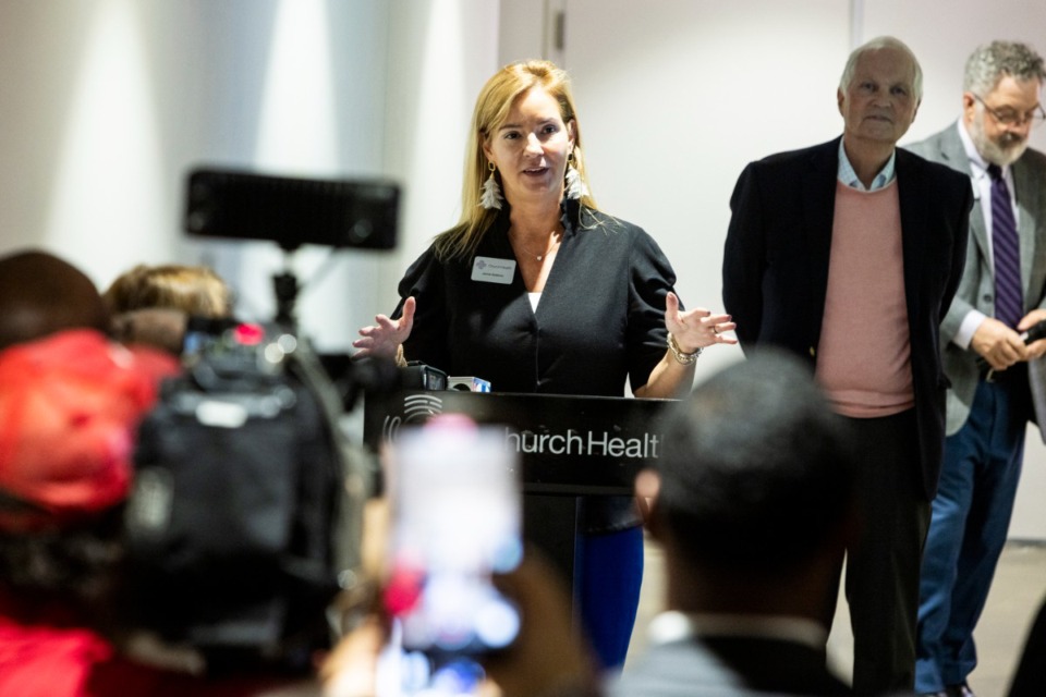 <strong>Jennie Robbins Chief Executive Officer of Church Health, speaks during the grand opening of its new eye clinic on the third floor at Crosstown Concourse.</strong> (Brad Vest/Special to The Daily Memphian)