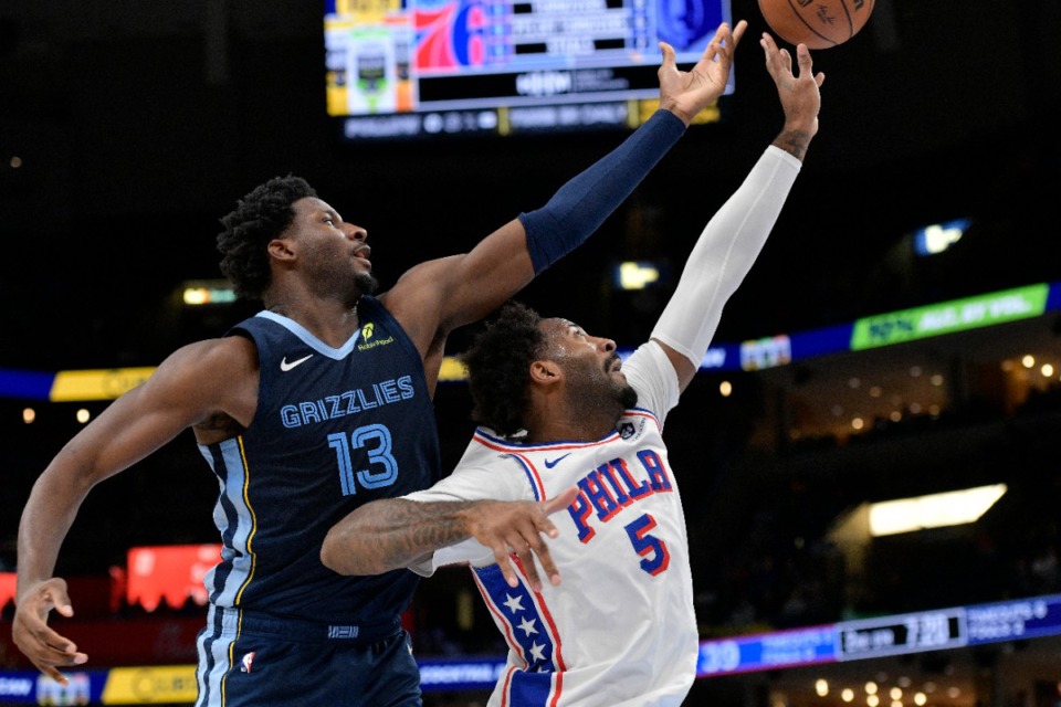 <strong>Memphis Grizzlies forward Jaren Jackson Jr. (13) shoots over Philadelphia 76ers center Andre Drummond (5) on Wednesday, Nov. 20, 2024.&nbsp;JJJ finished with 25 points.</strong> (Brandon Dill/AP)