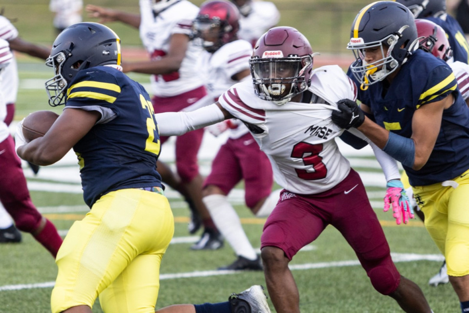 <strong>Memphis Academy of Science and Engineering&rsquo;s Christopher Watson, the player of the week, reaches for a rushing Lausanne player on Nov. 22, 2024.</strong>&nbsp;(Brad Vest/The Daily Memphian file)