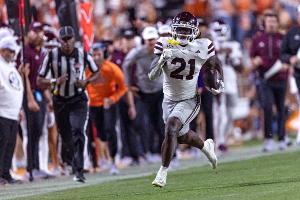 <strong>Mississippi State running back Davon Booth runs for yardage during the second half of an NCAA college football game against Tennessee, Saturday, Nov. 9, 2024, in Knoxville, Tenn.</strong> (AP Photo/Wade Payne)