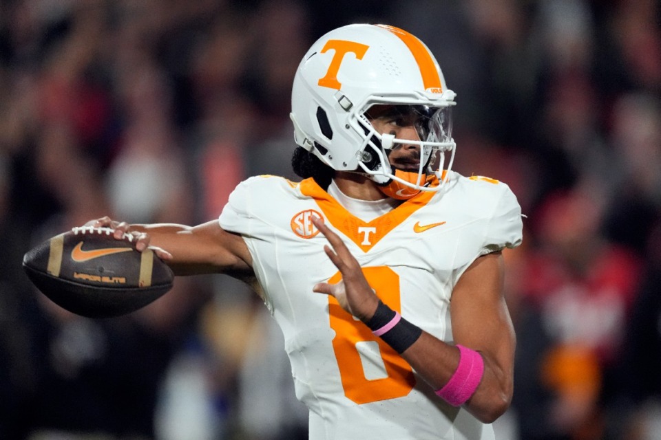 <strong>Tennessee quarterback Nico Iamaleava (8) thros a pass during the first half of an NCAA college football game against Georgia, Saturday, Nov. 16, 2024, in Athens, Ga.</strong> (AP Photo/John Bazemore)