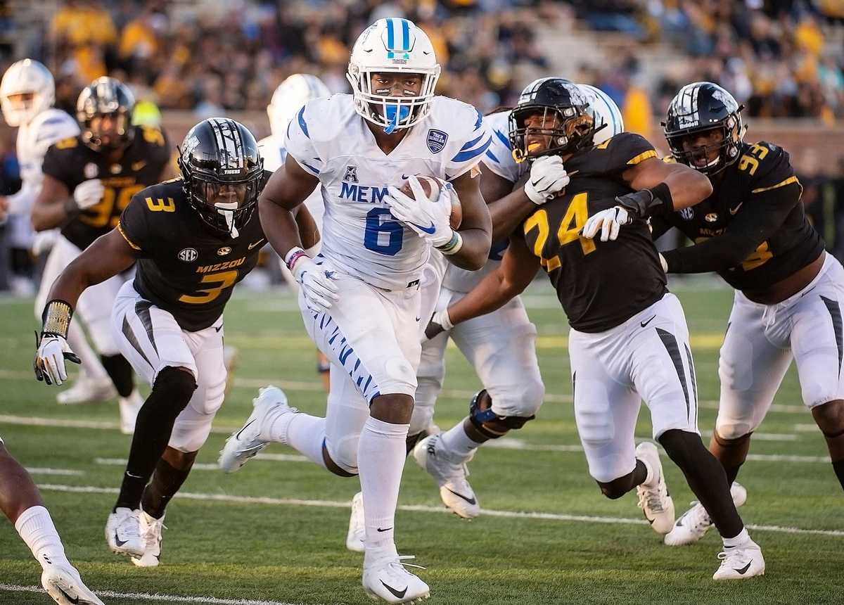 <strong>Memphis running back Patrick Taylor Jr. scrambles past Missouri defenders for a touchdown during the second half of an NCAA college football game Saturday, Oct. 20, 2018, in Columbia, Mo. Missouri won the game 65-33.</strong> (AP Photo/L.G. Patterson)