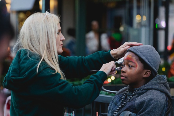 <strong>Face painters practice their craft on Main Street during the Saturday, Nov. 23, 2024 Downtown Holiday Tree Lighting sponsored by the Downtown Memphis Commission.</strong> (Ziggy Mack/Special to The Daily Memphian)