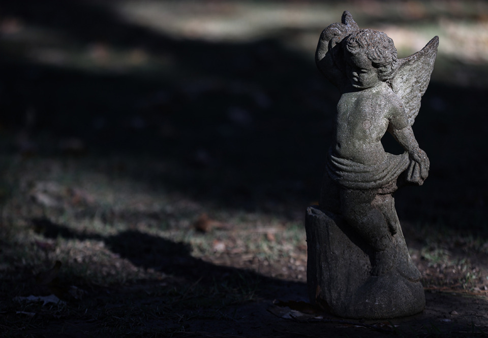 <strong>A small, weathered unmarked gravestone lies in the St. John's Episcopal Church Cemetery on Central Avenue</strong>. (Patrick Lantrip/The Daily Memphian)