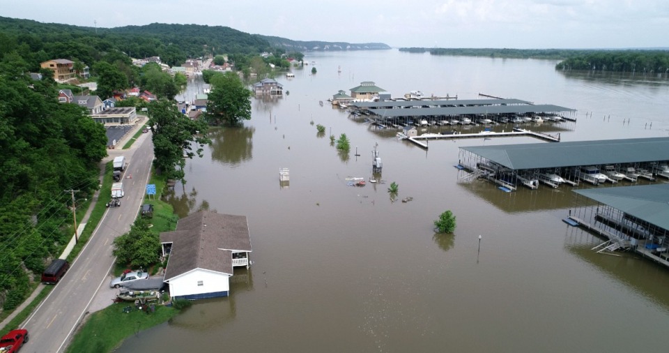 <strong>Floodwaters from the Mississippi River engulf the riverfront and Main Street of Grafton, Ill. on May 29, 2019. The community was among many that suffered a combined billions of dollars in damages from the flooding that year.</strong> (Courtesy Brent Jones/St. Louis Public Radio)