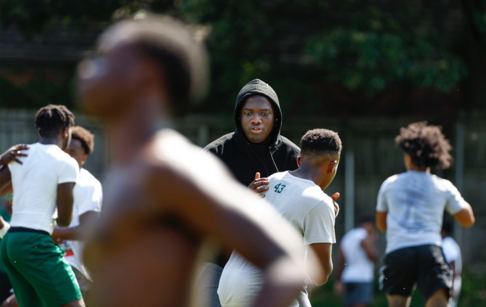 <strong>White Station offensive tackle Ray Curry (in black hoodie) blocks while going over plays during practice Monday, Aug. 26. "I know my ability and I know what I can do," he says.</strong>&nbsp;(Mark Weber/Daily Memphian)