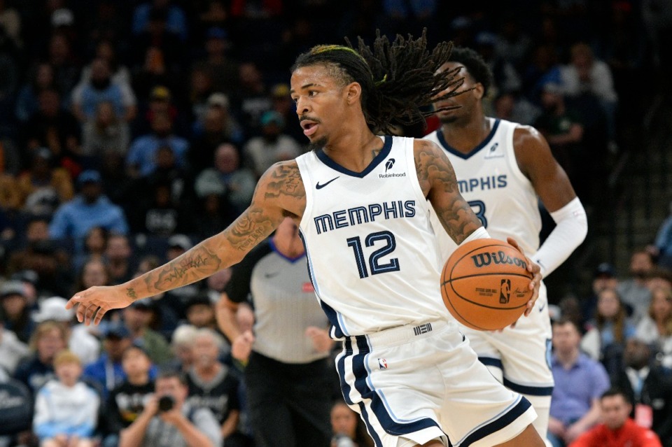 <strong>Memphis Grizzlies guard Ja Morant (12) scored 22 points and 11 rebounds against the Portland Trail Blazers Monday, Nov. 25, 2024, in 23 minutes.</strong> (Brandon Dill/AP)