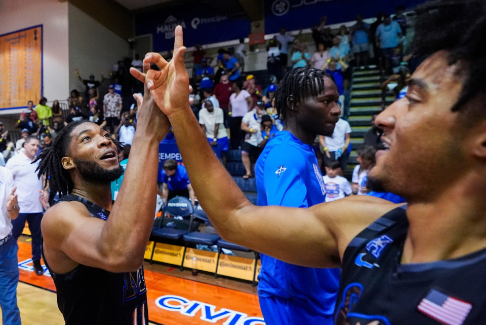 <strong>Memphis guard Tyrese Hunter, left, celebrates a 71-63 win against Michigan State with guard PJ Haggerty in an NCAA college basketball game at the Maui Invitational Tuesday, Nov. 26, 2024, in Lahaina, Hawaii.</strong> (AP Photo/Lindsey Wasson)