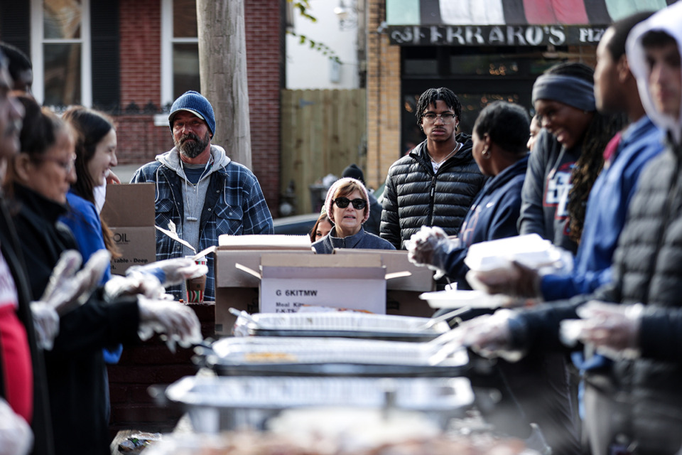 <strong>More than 75 volunteers form an assembly line to make plates at Westy's Downtown during their annual Thanksgiving meal giveaway Thursday, Nov. 28.</strong> (Patrick Lantrip/The Daily Memphian)