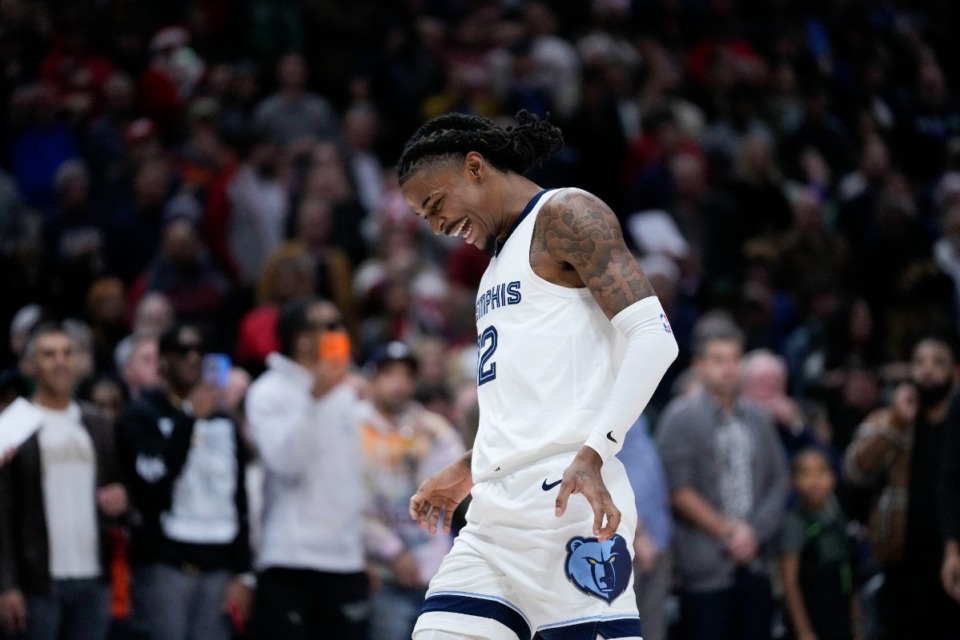 <strong>Memphis Grizzlies guard Ja Morant (12) reacts after the New Orleans Pelicans missed a key basket in the second half of an NBA basketball game in New Orleans, Dec. 19, 2023. The Grizzlies won 115-113.</strong> (Gerald Herbert/AP file)