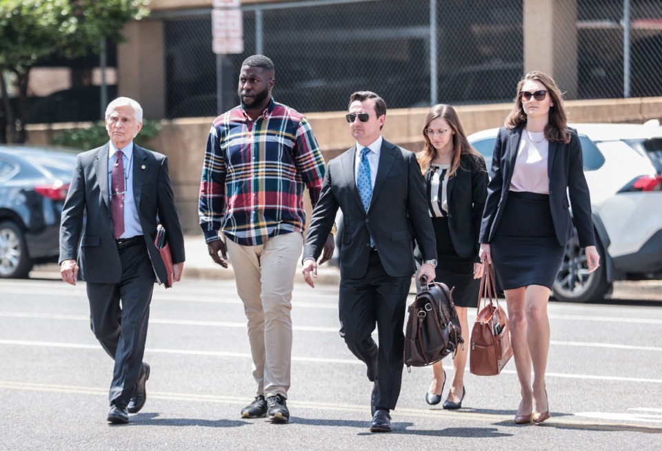 <strong>Flanked by his attorneys, former MPD officer Emmitt Martin (second from left) walks into the Odell Horton Federal Building Aug. 23, 2024.</strong> (Patrick Lantrip/The Daily Memphian file)