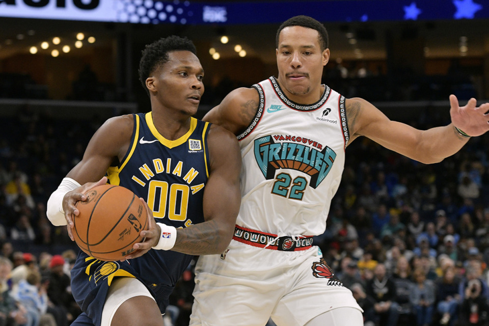 <strong>Indiana Pacers guard Bennedict Mathurin (00) drives against Memphis Grizzlies guard Desmond Bane (22) in the first half of an NBA basketball game Sunday, Dec. 1, 2024, in Memphis.</strong> (Brandon Dill/AP Photo)