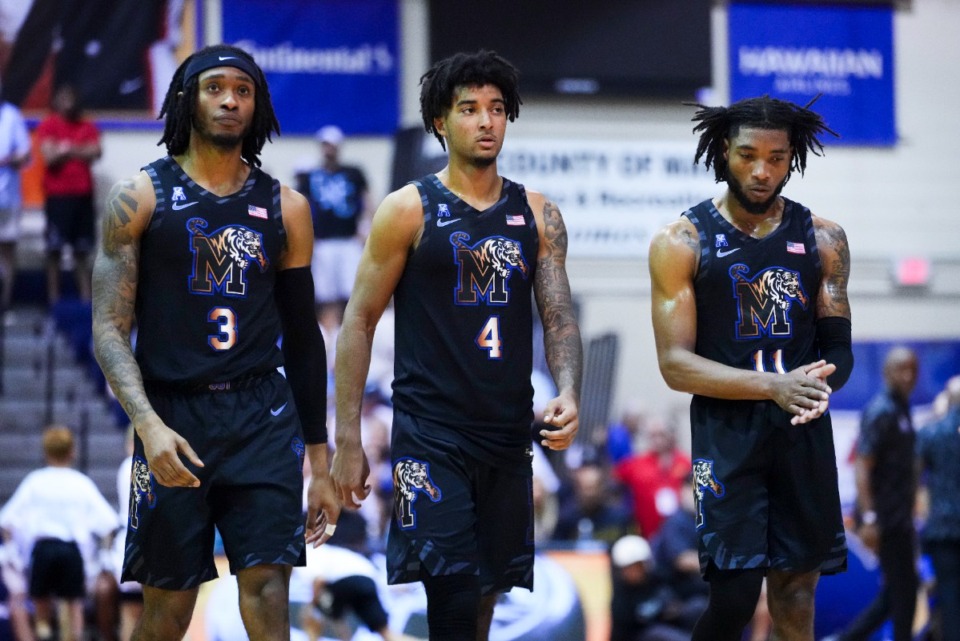 <strong>Memphis guard Colby Rogers (3), guard PJ Haggerty (4) and guard Tyrese Hunter (11) walk on the court after a foul during the second half of the championship game of the NCAA college basketball Maui Invitational tournament against Auburn, Wednesday, Nov. 27, 2024, in Lahaina, Hawaii.</strong> (AP Photo/Lindsey Wasson)