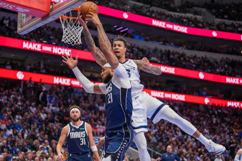 <strong>Memphis Grizzlies forward Brandon Clarke, right, and Dallas Mavericks center Daniel Gafford compete for a rebound Tuesday, Dec. 3, 2024, in Dallas.</strong> (Julio Cortez/AP)