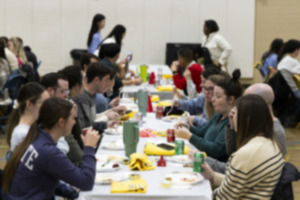 <strong>The Southern College of Optometry marathon team loads up on carbs Dec. 6, 2024, the night before the St. Jude Memphis Marathon.</strong> (Brad Vest/Special to The Daily Memphian)