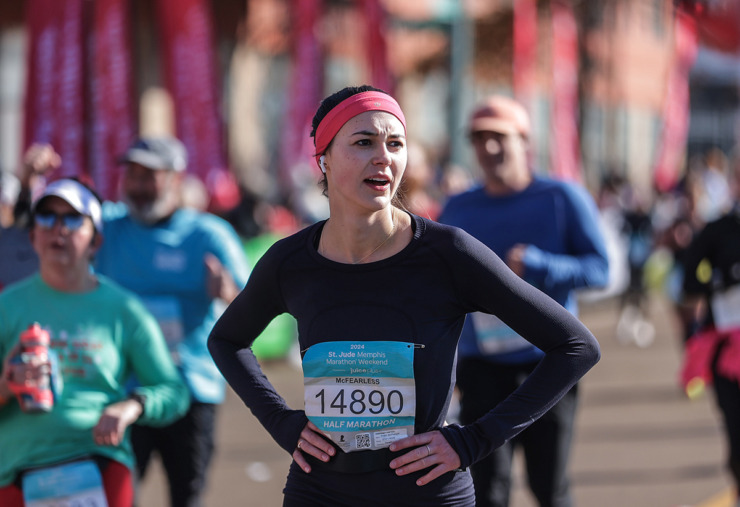 <strong>Alexa McPherson takes a deep breath after finishing the St. Jude Memphis Marathon on Dec. 7.</strong> (Patrick Lantrip/The Daily Memphian)