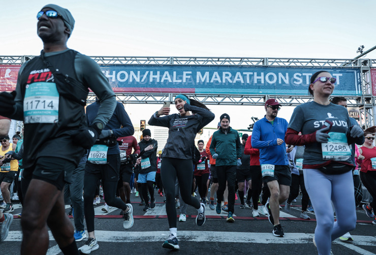 <strong>It's all smiles as the first wave of runners starts the St. Jude Memphis Marathon on Dec. 7.</strong> (Patrick Lantrip/The Daily Memphian)