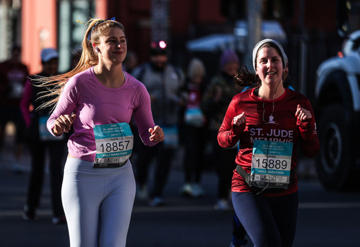 <strong>Sophia Rose and Jaclyn Hopp make their way down Second Street during the St. Jude Memphis Marathon on Dec. 7.</strong> (Patrick Lantrip/The Daily Memphian)