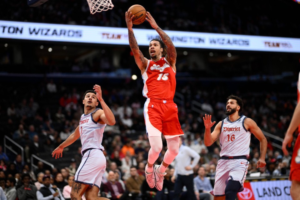 <strong>Memphis Grizzlies forward Brandon Clarke (15) goes to the basket against Washington Wizards forward Anthony Gill (16) and guard Johnny Davis (1) on Sunday, Dec. 8, 2024, in Washington</strong>. (Nick Wass/AP)