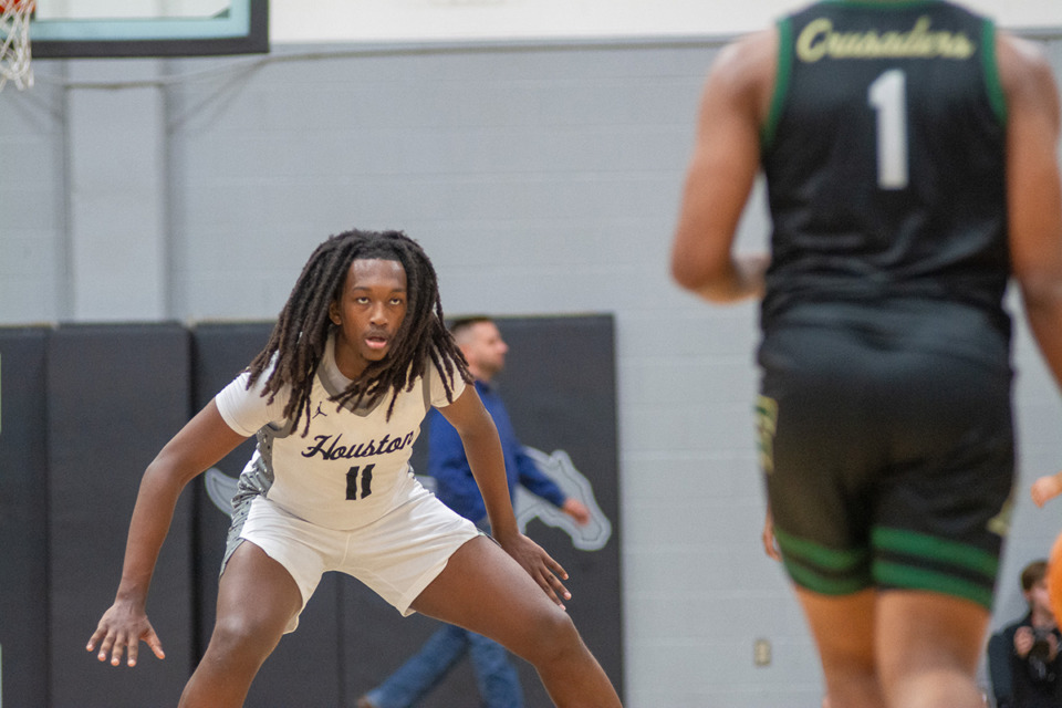 <strong>Houston's Keron Jackson (11) gets set to defend against FACS late in the fourth quarter Friday, Dec. 8t 2023.</strong> (Joshua White/Special to The Daily Memphian file)