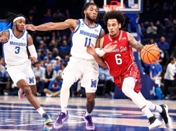 University of Memphis defender Tyrese Hunter (middle) applies pressure to Arkansas State guard Taryn Todd (left) on Sunday, Dec. 8, 2024. (Mark Weber/The Daily Memphian)