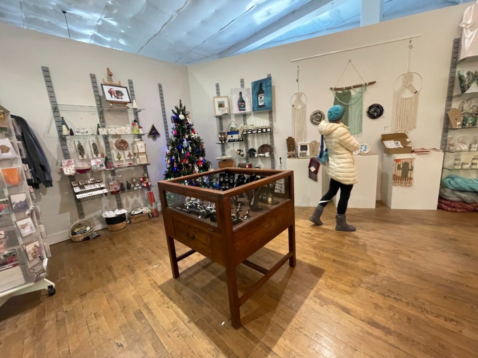 <strong>A shopper browses Arrow Creative&rsquo;s retail space in the Cooper-Young neighborhood. The organization is ceasing operations at the end of the year. </strong>(Julia Baker/The Daily Memphian)