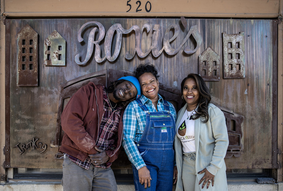 <strong>From left: Bobby Rich III, Camille James and Derravia Rich stand outside Roxie's Market in Uptown on Dec. 3.&nbsp;Eventually, the team would like to open the market five days a week.</strong> (Patrick Lantrip/The Daily Memphian)