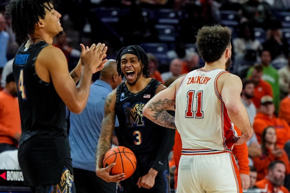 <strong>Memphis guard Colby Rogers (3) celebrates a win against Clemson in overtime of an NCAA basketball game Saturday, Dec. 14, in Clemson, S.C.</strong> (Mike Stewart/AP file)