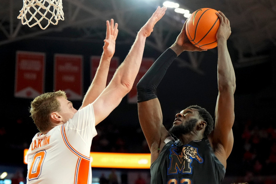 <strong>Memphis center Moussa Cisse (32) shoots against Clemson center Viktor Lakhin (0) during the first half of an NCAA basketball game, Saturday, Dec. 14, 2024, in Clemson, S.C.</strong> (AP Photo/Mike Stewart)