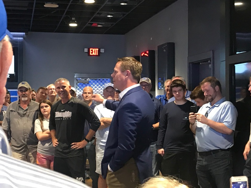 <strong>New University of Memphis Athletic Director Laird Veatch (center, in suit) made his first public appearance at the Highland Hundred meeting Friday, Aug. 30, with head coach Mike Norvell (left of center, in black).</strong> (Jonah Jordan/Daily Memphian)