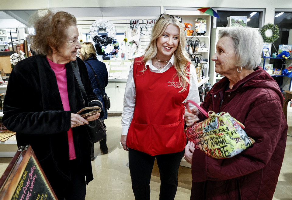 <strong>Woman's Exchange Executive Director Dena Nance (middle) chats with customers during lunch on Friday, Dec. 6, 2024.</strong> (Mark Weber/The Daily Memphian)