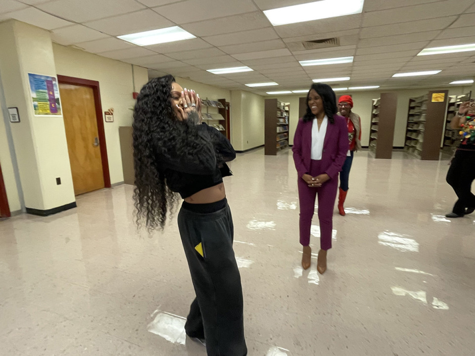 <strong>GloRilla prepares to give remarks in the library at Melrose High that will be named in her honor. She is donating $25,000 toward media center improvements.</strong> (Julia Baker/The Daily Memphian)