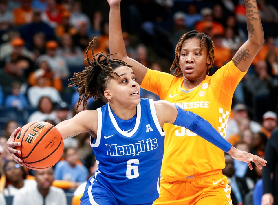 <strong>Memphis Tigers guard DeeDee Hagemann (left) drives the lane against Tennessee&rsquo;s Alyssa Latham (right) on Wednesday, Dec. 18, 2024.</strong> (Mark Weber/The Daily Memphian)