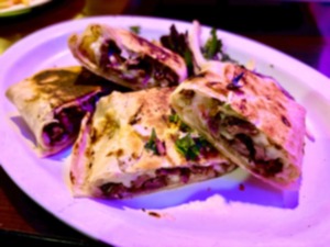 <strong>Ali Baba Restaurant&rsquo;s lamb shawarma wrap for $9.99. The wrap has a smoky-sweet flavor from the open-fire cooking.</strong> (Joshua Carlucci/Special to The Daily Memphian)