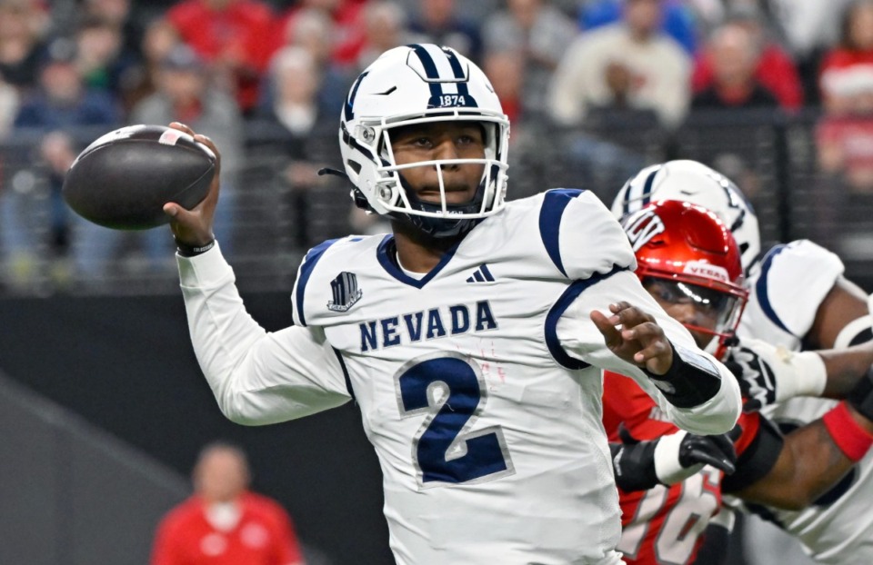 <strong>Nevada quarterback Brendon Lewis (2) looks to pass against UNLV during the first half of an NCAA college football game Saturday, Nov. 30, in Las Vegas.</strong> (David Becker/AP file)