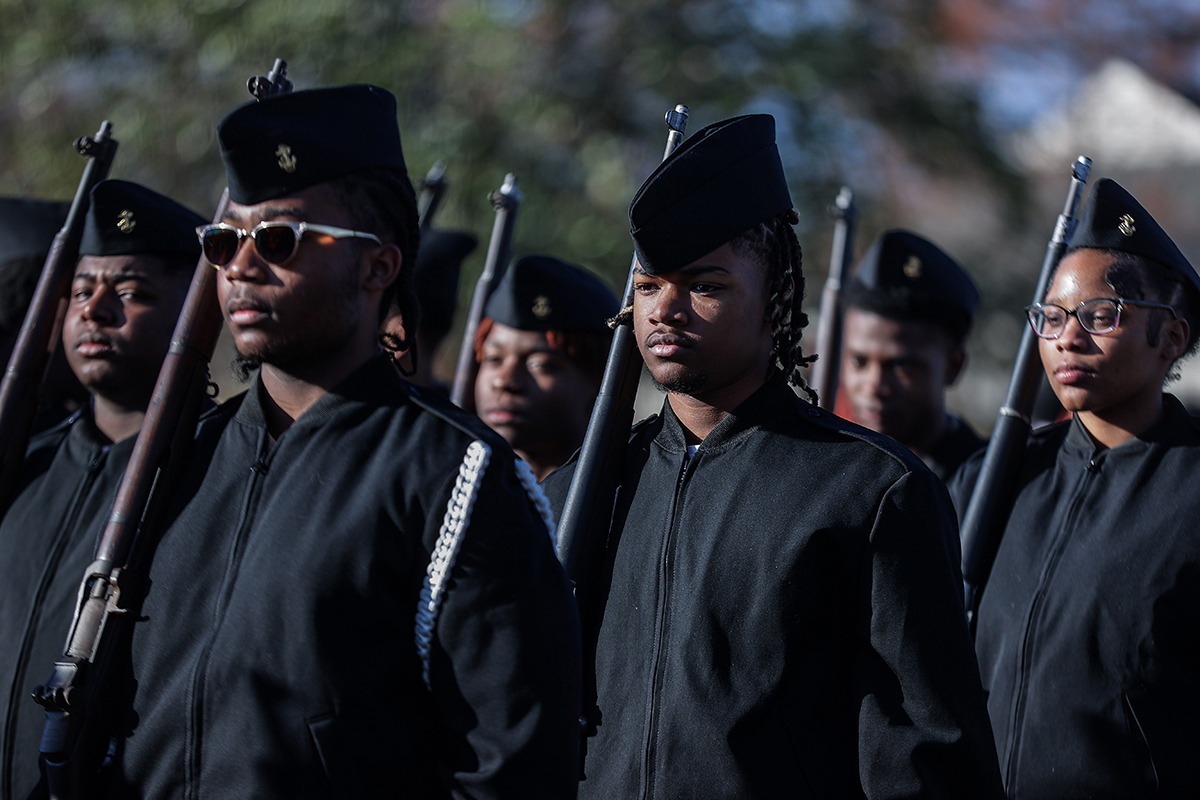 <strong>The MASE ROTC leads a march down Poplar Avenue celebrating the school's first state championship in football Dec. 20.</strong> (Patrick Lantrip/The Daily Memphian)